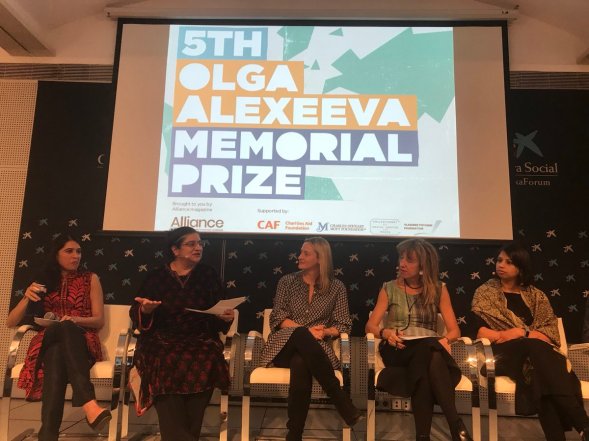 Puja Marwaha accepts the 5th Olga Alexeeva Memorial Prize at WINGS Funders Meeting